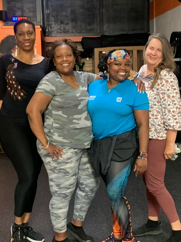 Group of women celebrating after a class at PinPoint Training